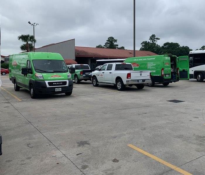 SERVPRO vans in parking lot.