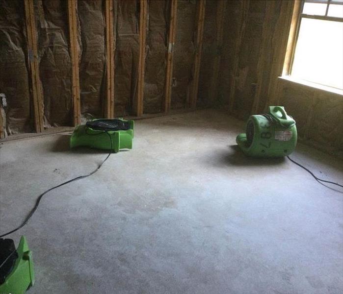 Water drying equipment on floor.